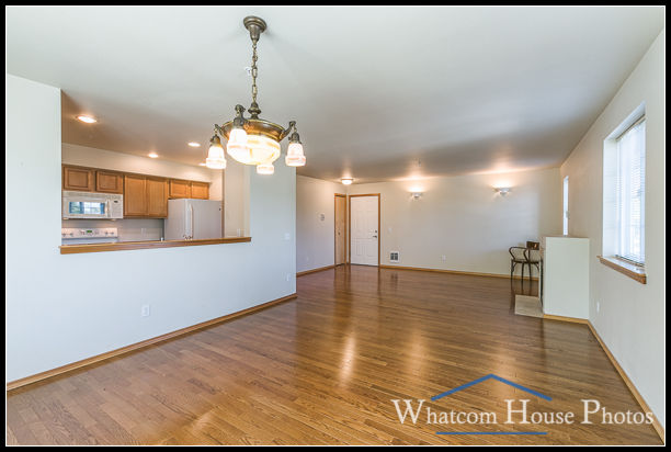 Great room dining area view to kitchen and living room